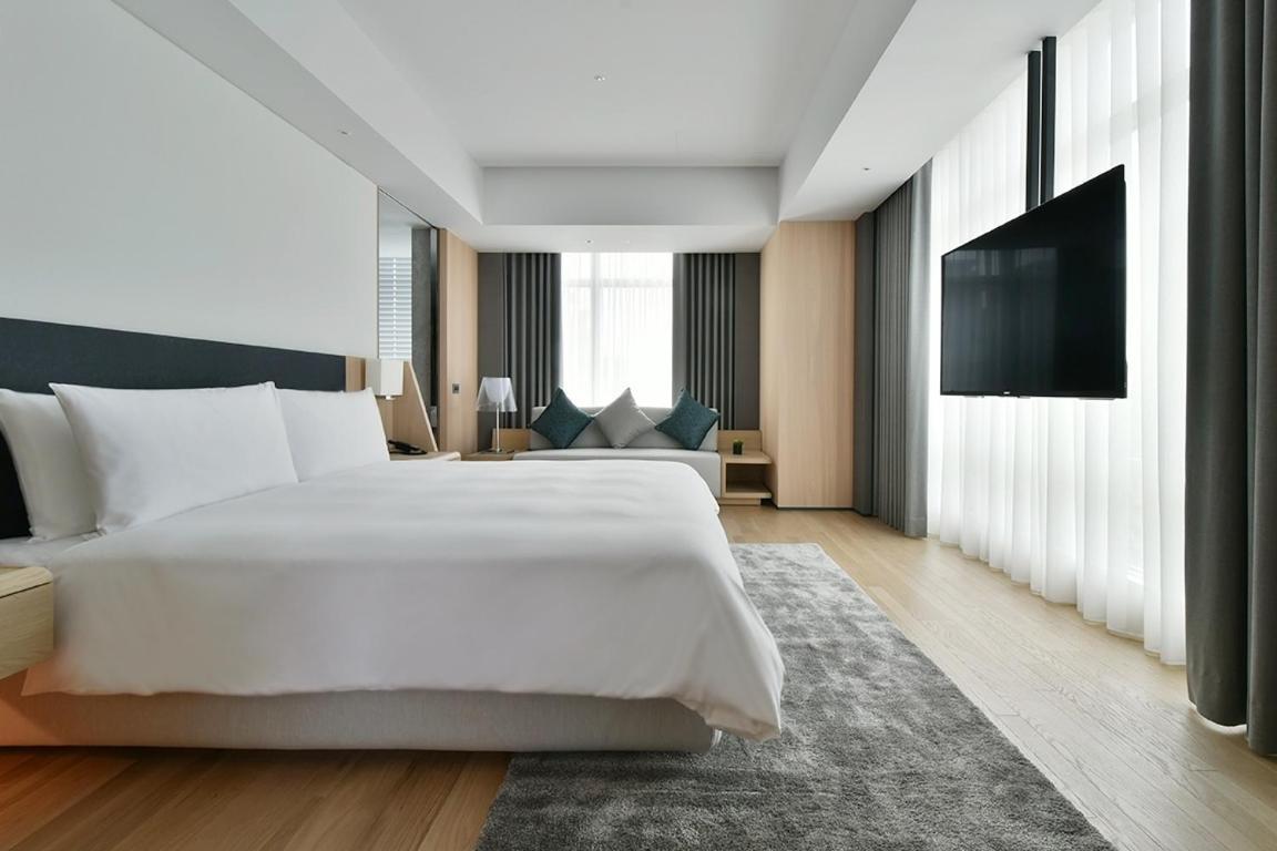 Silks Club Hotel Kaohsziung Kültér fotó Deluxe Room